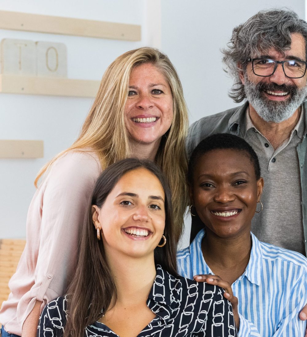 cheerful-diverse-coworking-women-looking-at-camera-2025-04-04-18-42-06-utc